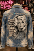 Dream More Worry Less bleached denim jacket back view on mannequin with turquoise rhinestone trim and Dolly Parton quote graphic