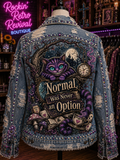 Normal Was Never an Option distressed denim jacket back view on mannequin with Cheshire Cat gothic fantasy graphic and rhinestone trim